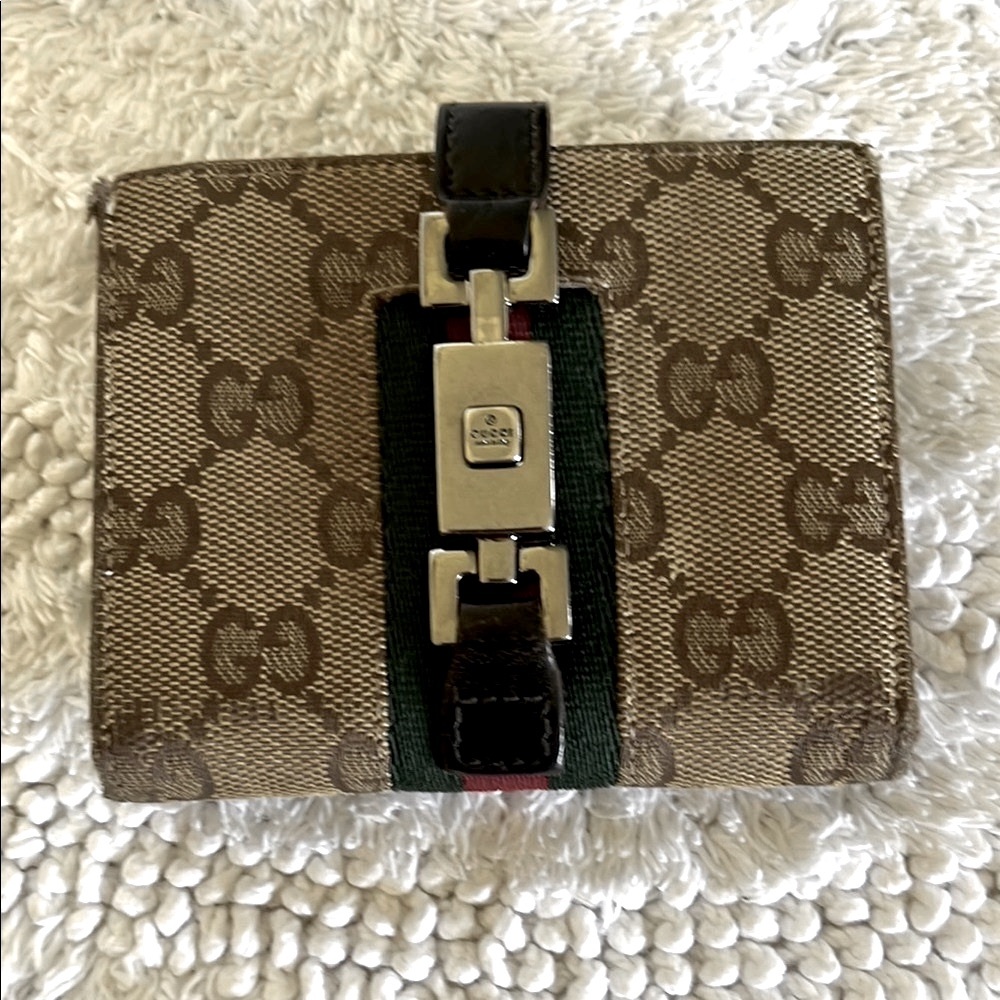 Gucci Monogram Wallet with Stripe Accent. Used